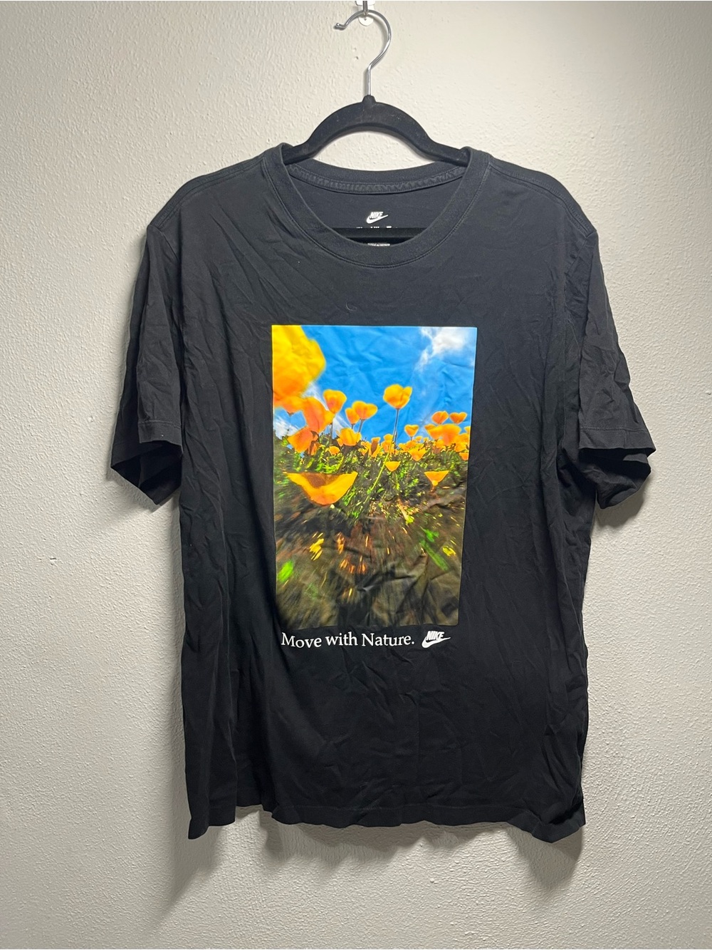 Nike Men’s Black Short Sleeve Tee with Yellow Floral Graphic
